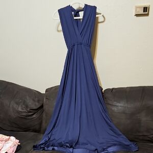 Sleeveless Deep V Navy Maxi Dress with Gathered Waist And Tie Neck.